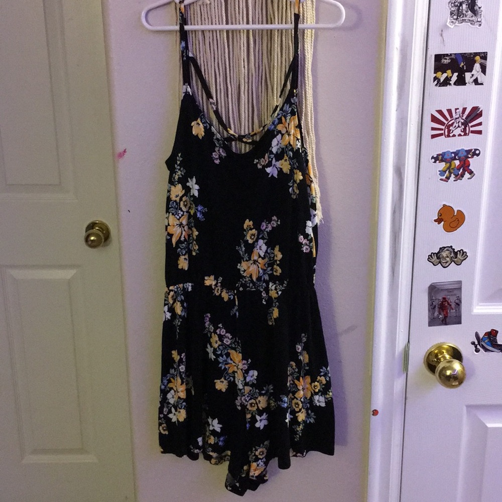 Floral tank romper with cross-string back